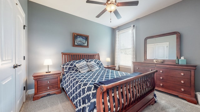 bedroom featuring ceiling fan and light colored carpet