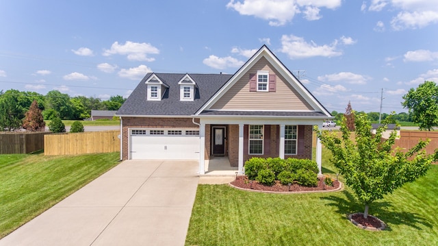 view of front of house with a front lawn and a garage