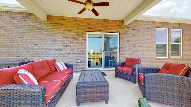 view of terrace with ceiling fan and an outdoor hangout area