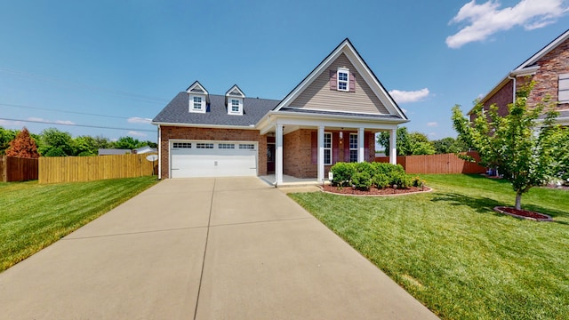 view of front of house with a front lawn, a porch, and a garage