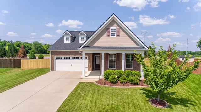 view of front facade with a front yard and a garage