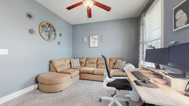 carpeted office with ceiling fan