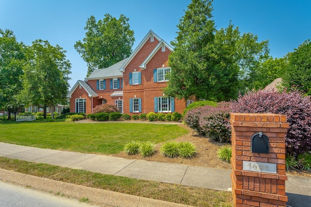 view of front of home with a front yard