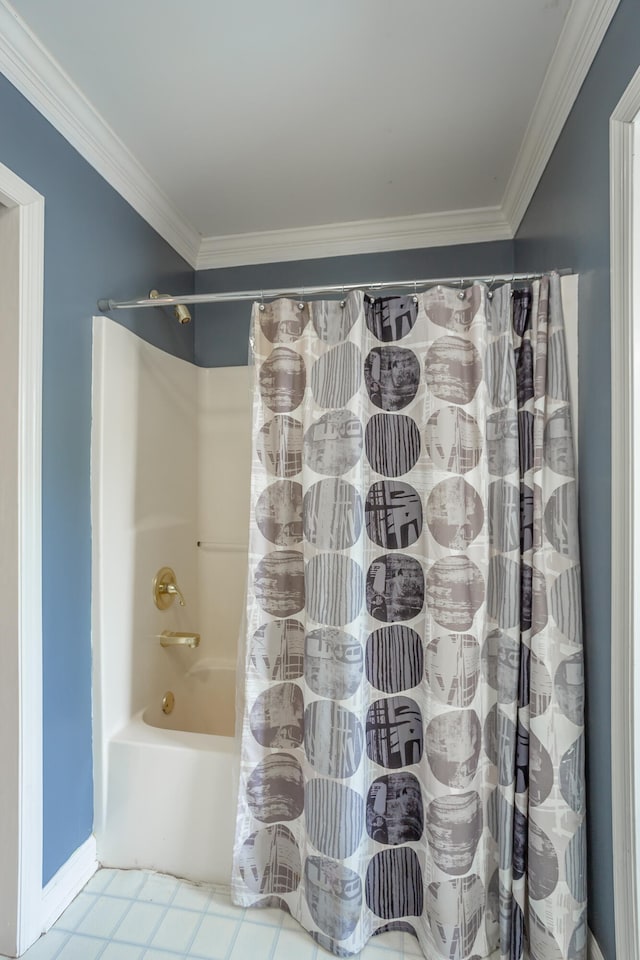 bathroom with ornamental molding, tile floors, and shower / bath combo with shower curtain