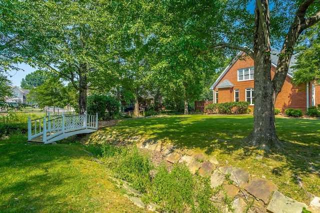 view of yard featuring a deck