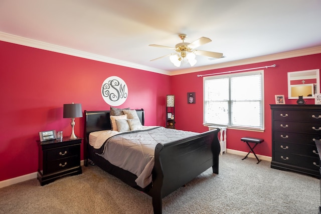 carpeted bedroom featuring ornamental molding and ceiling fan