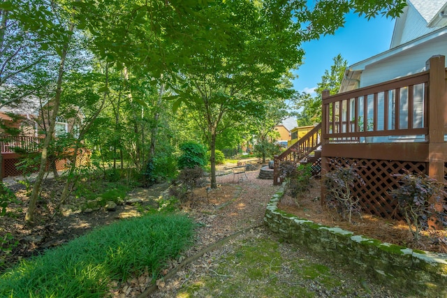 view of yard featuring a deck