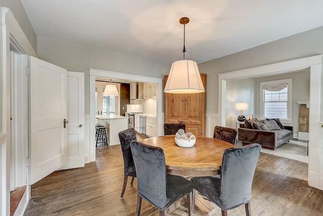 dining area with dark wood-type flooring