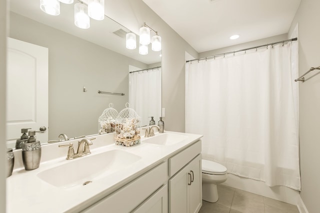 full bathroom featuring shower / bath combo, dual sinks, tile flooring, toilet, and oversized vanity