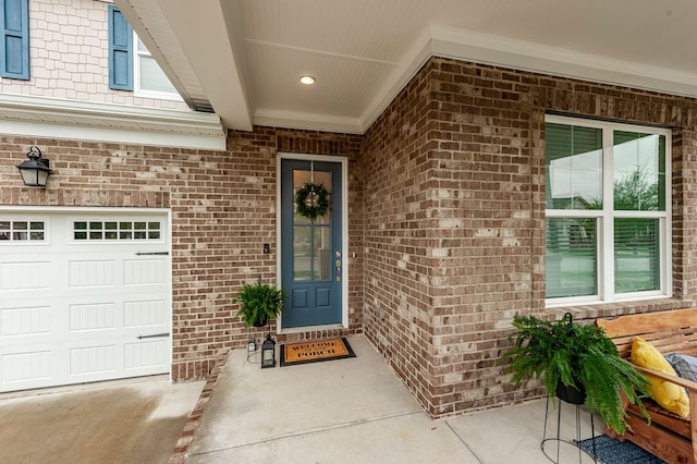 property entrance with a garage