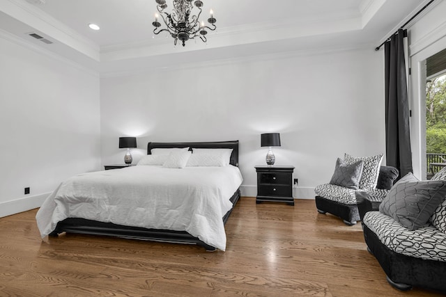 3609 Leipers Valley Trl, Franklin, TN 37064 - bedroom with dark hardwood / wood-style flooring, crown molding, a chandelier, and a tray ceiling