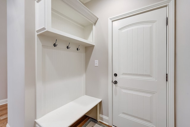 mudroom with wood-type flooring