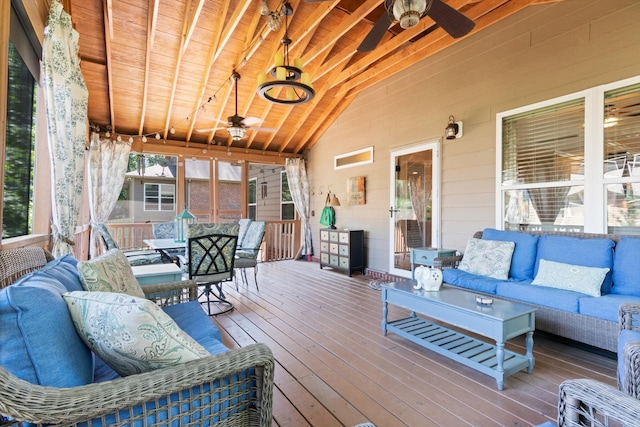 wooden deck with ceiling fan and outdoor lounge area