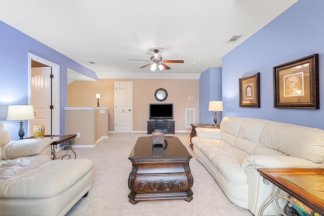 living room featuring ceiling fan and light carpet