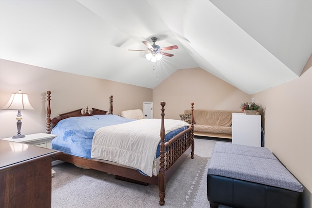 bedroom featuring light carpet, vaulted ceiling, and ceiling fan