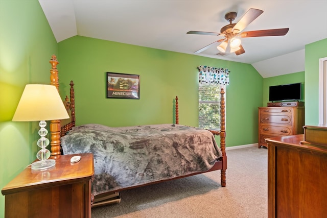 bedroom with light carpet, ceiling fan, and vaulted ceiling