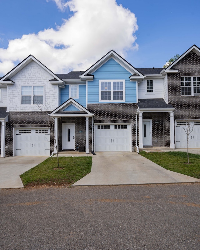 view of front of property with a garage