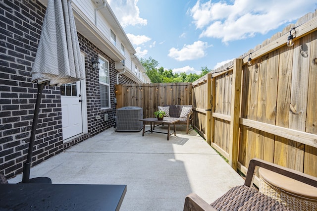 view of patio / terrace with central AC