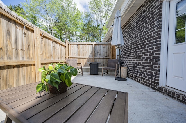 wooden deck featuring a patio area