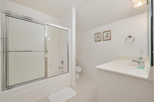 full bathroom with shower / bath combination with glass door, tile floors, oversized vanity, and toilet