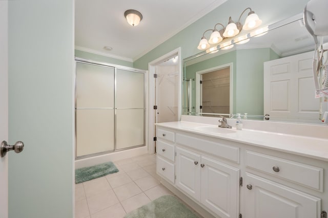 bathroom with walk in shower, ornamental molding, tile floors, and vanity