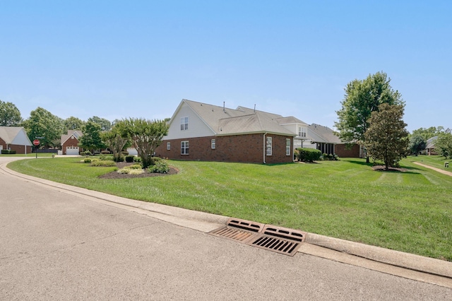 view of front of property with a front lawn