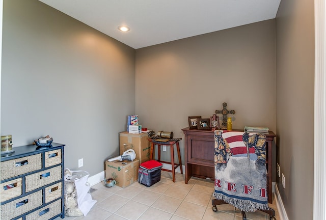 miscellaneous room featuring light tile flooring