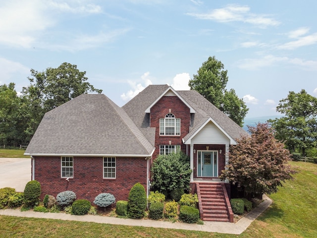 view of front of home with a front yard