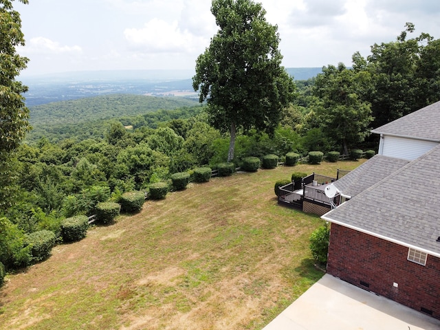 view of yard with a deck