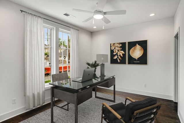 office with ceiling fan and dark wood-type flooring