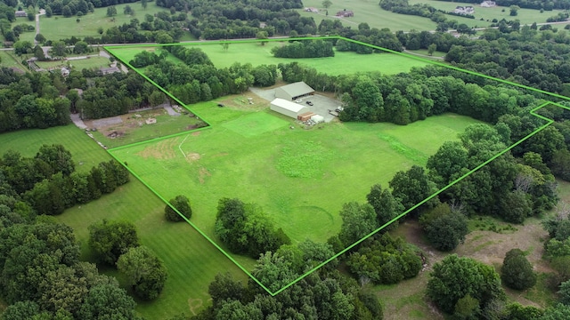 birds eye view of property featuring a rural view