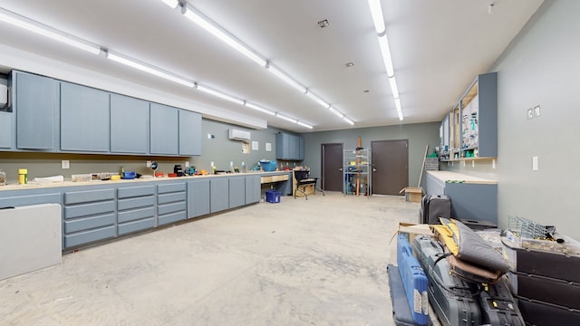 garage with a wall mounted air conditioner