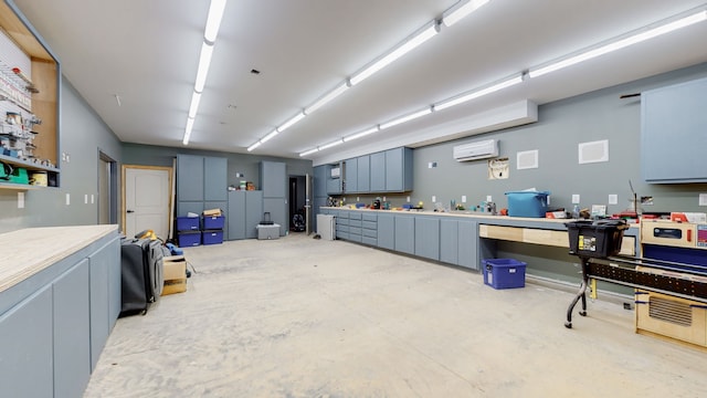 garage featuring an AC wall unit