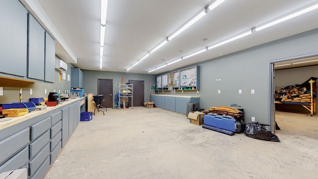 garage with a wall mounted air conditioner