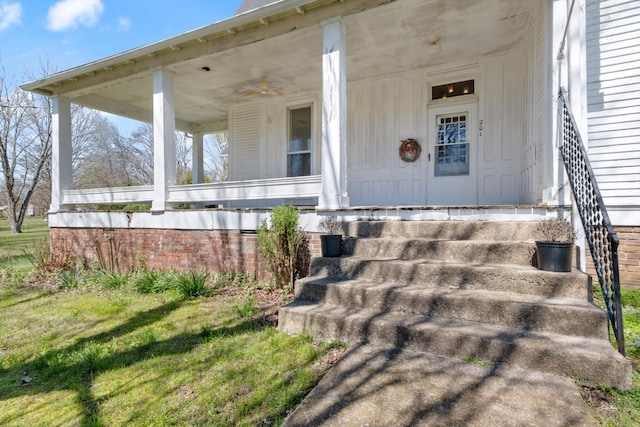 doorway to property with a porch