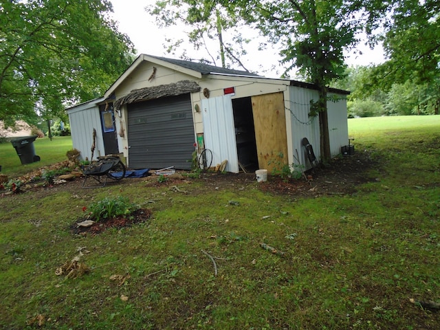 view of outdoor structure with a yard