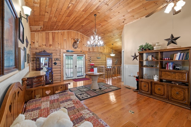 dining room featuring lofted ceiling, french doors, wood finished floors, and wood ceiling