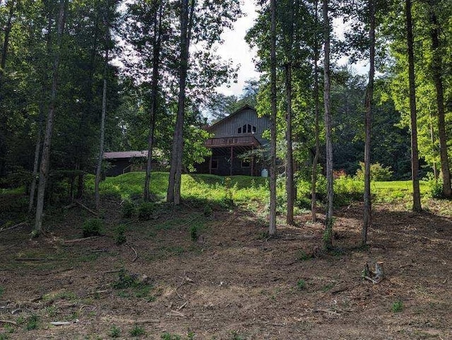 view of yard featuring a wooden deck