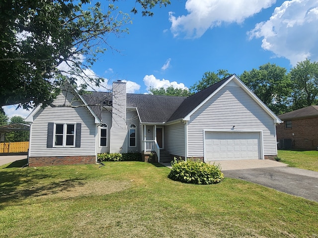 view of front facade with a front lawn and a garage