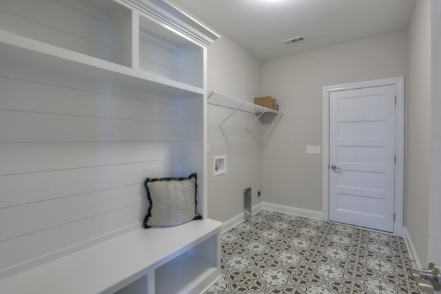 laundry area with electric dryer hookup, washer hookup, and light tile floors