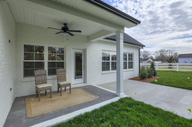 view of terrace featuring ceiling fan