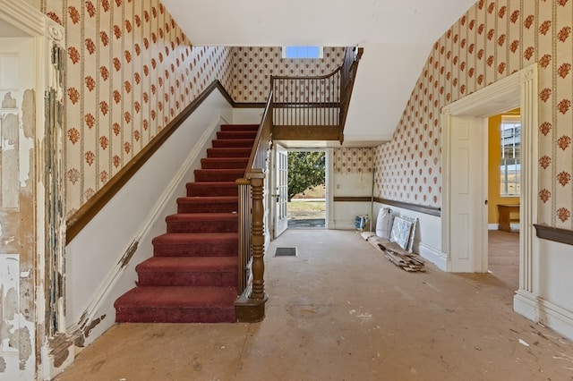 stairs with a high ceiling