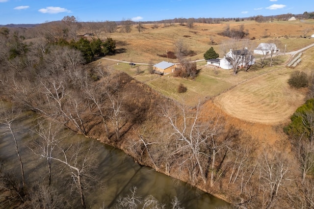 aerial view featuring a rural view and a water view