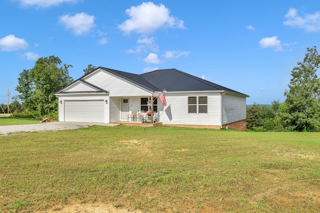 single story home with a front lawn and a garage