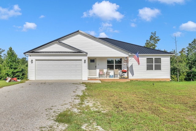 ranch-style home with a front yard, a porch, and a garage