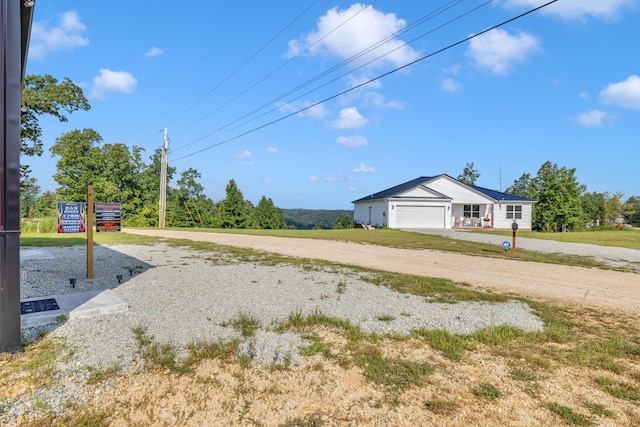 view of yard with a garage