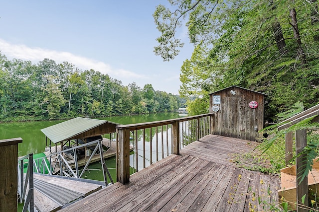 deck featuring a water view and a dock