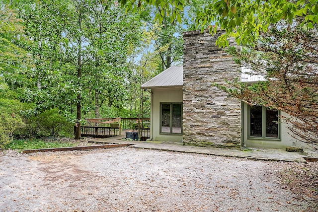 exterior space featuring a wooden deck