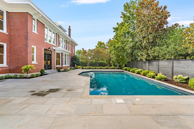 view of pool with a patio