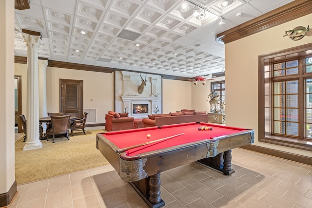 game room featuring ornate columns, light tile floors, a large fireplace, and pool table